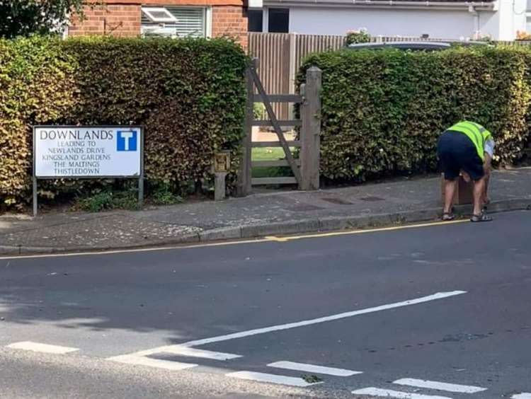 A local road safety vigilante was caught on camera hand-painting double yellow lines in Walmer near Deal, Kent. (SWNS)