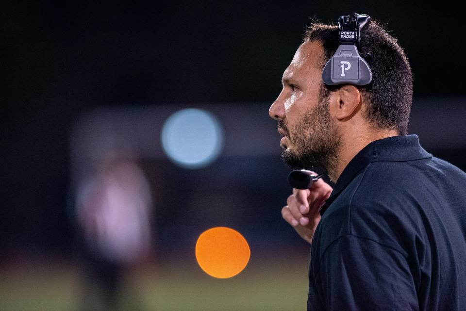 September 17, 2021; Harrison, NJ, USA; Harrison High School host Emerson in a football game in Harrison on Friday September 17, 2021. Emerson head coach Nick Calandrino looks on from the sidelines. Mandatory Credit: Anne-Marie Caruso/NorthJersey.com via USA TODAY NETWORK