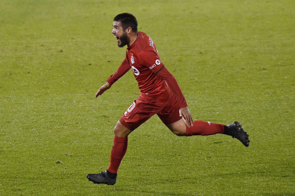 Toronto FC's Alejandro Pozuelo celebrates his goal during the second half of an MLS soccer match against the Philadelphia Union, Saturday, Oct. 3, 2020, in East Hartford, Conn. (AP Photo/Jessica Hill)