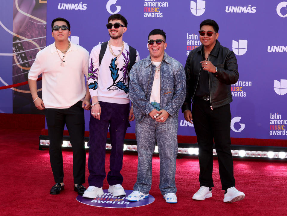 LAS VEGAS, NEVADA - APRIL 20: (L-R) Damian Pacheco, Brian Tovar, Pedro Tovar and Ulises Gonzalez of Eslabon Armado attend the 2023 Latin American Music Awards at MGM Grand Garden Arena on April 20, 2023 in Las Vegas, Nevada. (Photo by Ethan Miller/Getty Images)