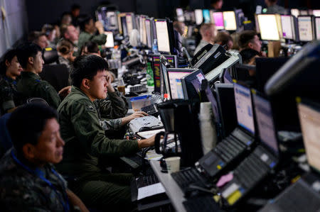 FILE PHOTO: Members from U.S. and Republic of Korea militaries man the Hardened Theater Air Control Center during the first day of Ulchi Freedom Guardian at Osan Air Base, South Korea, August 17, 2015. Courtesy John Linzmeier/U.S. Air Force photo/Handout via REUTERS