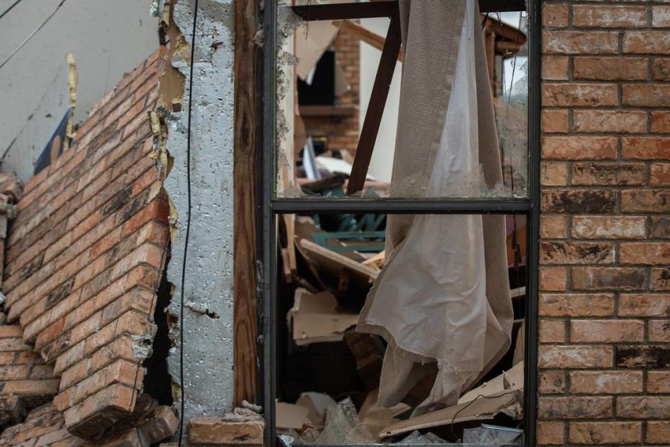 The lodge at the Barn on the Brazos wedding venue is seen after it was destroyed by a tornado Tuesday, May 4, 2021, in Blum.