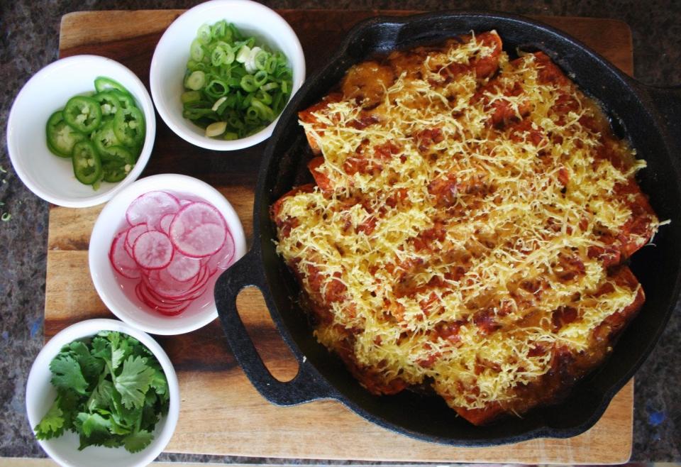 Top your baked enchiladas with jalapeños, green onions, cilantro and watermelon radishes.