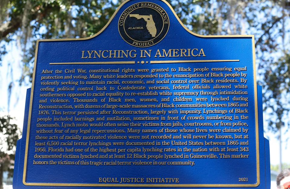 This historical marker outside of the Alachua County Administration Building in Gainesville acknowledges the lynchings of Blacks locally during the Reconstruction and Jim Crow eras. [Julia Cooper/The Gainesville Sun]