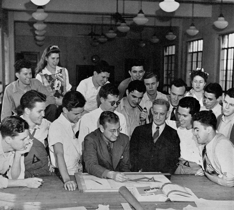 Samuel Gideon, dressed in the dark suit front right, with architecture students at Goldsmith Hall on the University of Texas campus in 1942. This picture appeared in the Cactus yearbook for 1943.