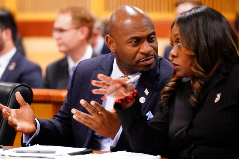 Special Prosecutor Nathan Wade and Executive District Attorney Daysha Young confer in the Superior Court of Fulton County