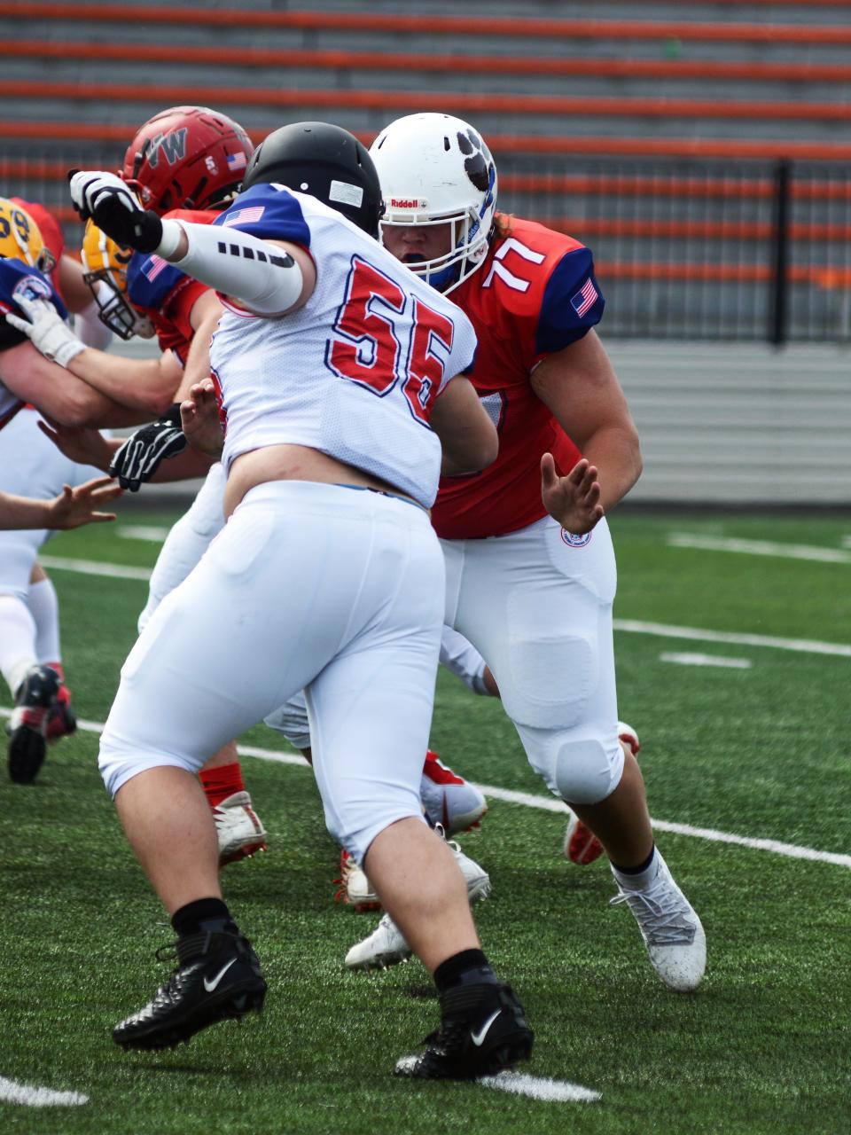 Maysville's Gauge Samson makes a block on Girard's Nasim Lloyd during the annual Ohio North-South All-Star Football Classic on Saturday at Paul Brown Tiger Stadium in Massillon.