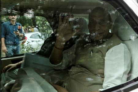 India's Defence Minister Rajnath Singh leaves after a meeting at the house of Prime Minister Narendra Modi's house in New Delhi