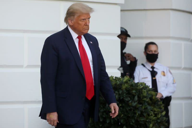 U.S. President Donald Trump walks without a mask as he leaves the White House during his departure on campaign travel to Johnstown, Pennsylvania, in Washington U.S.