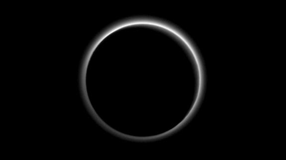 The hazy atmosphere of Pluto, backlit by the sun, is seen in this breathtaking farewell photo taken by NASA's New Horizons spacecraft on July 15, 2015 just after its historic flyby of the dwarf planet. Scientists can study the ring-like halo ar