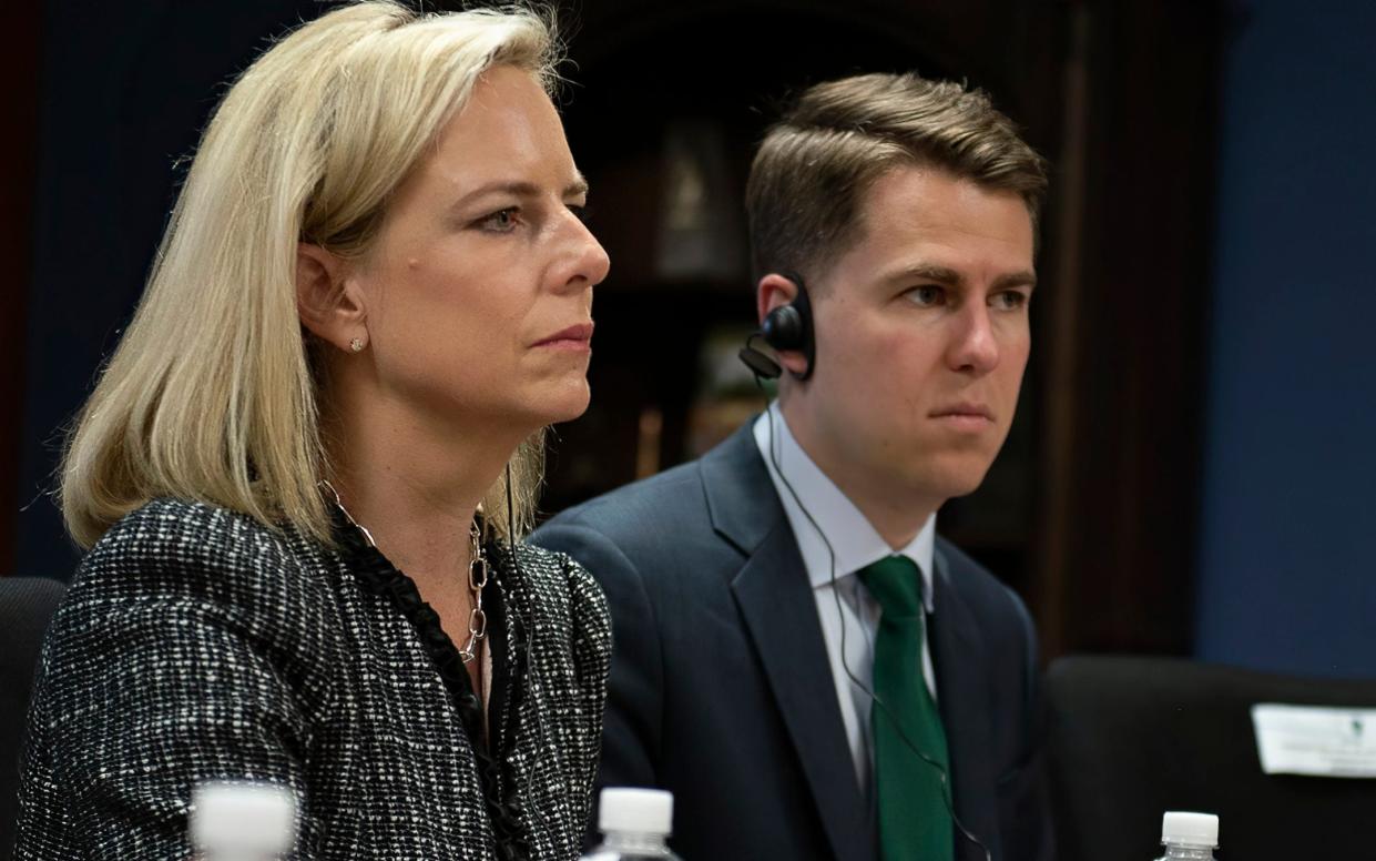  Kirstjen Nielsen and  Miles Taylor,  - Tim Godbee/Department of Homeland Security