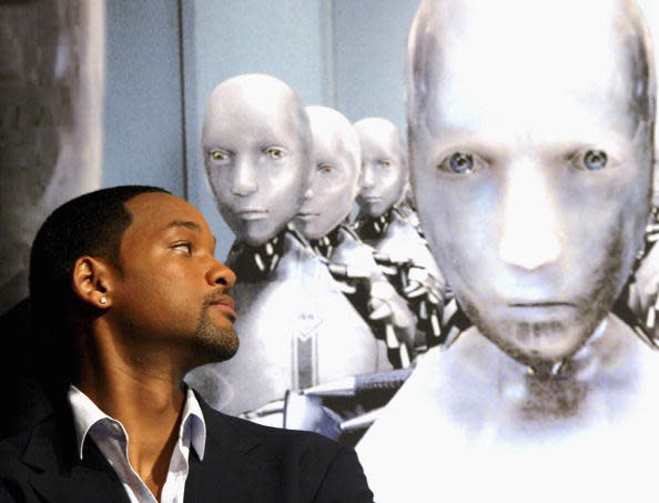 Will Smith casts a suspicious eye over his robot colleague... (Getty)