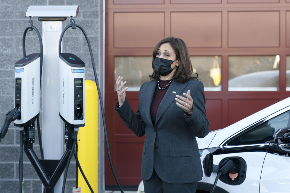 Vice President Kamala Harris speaks next to an electric vehicle and a charging station during her tour of the Brandywine Maintenance Facility in Prince George's County, Md., highlighting the electric vehicle investments in the bipartisan infrastructure law and the "Build Back Better Act" Monday, Dec. 13, 2021. (AP Photo/Manuel Balce Ceneta)