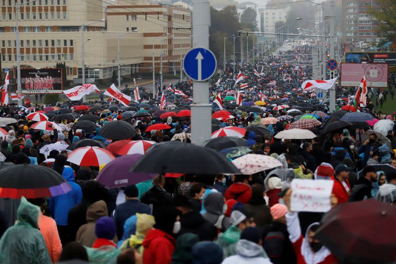 Belarusian opposition supporters hold a rally in Minsk