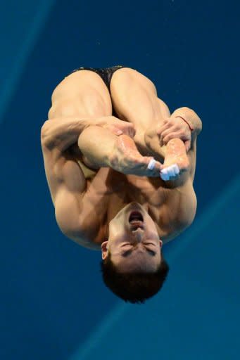 China's Qin Kai competes in the men's 3m springboard final during the diving event at the London 2012 Olympic Games. Qin won silver