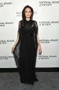 <p>Angelina covered up in a black, lace gown at the annual event.<em> [Photo: Getty]</em> </p>