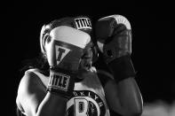 <p>Tasha Mathews covers against Deirdre McDermott in a “Fem Brawl” during the Brooklyn Smoker in Coney Island, Brooklyn, on Aug. 24, 2017. (Photo: Gordon Donovan/Yahoo News) </p>