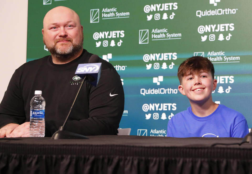 New York Jets general manager Joe Douglas and Make-A-Wish recipient Kyle Stickles, answer questions from reporters during an NFL football pre-draft press conference on Tuesday, April 25, 2023, in Florham Park, N.J. (AP Photo/Noah K. Murray)