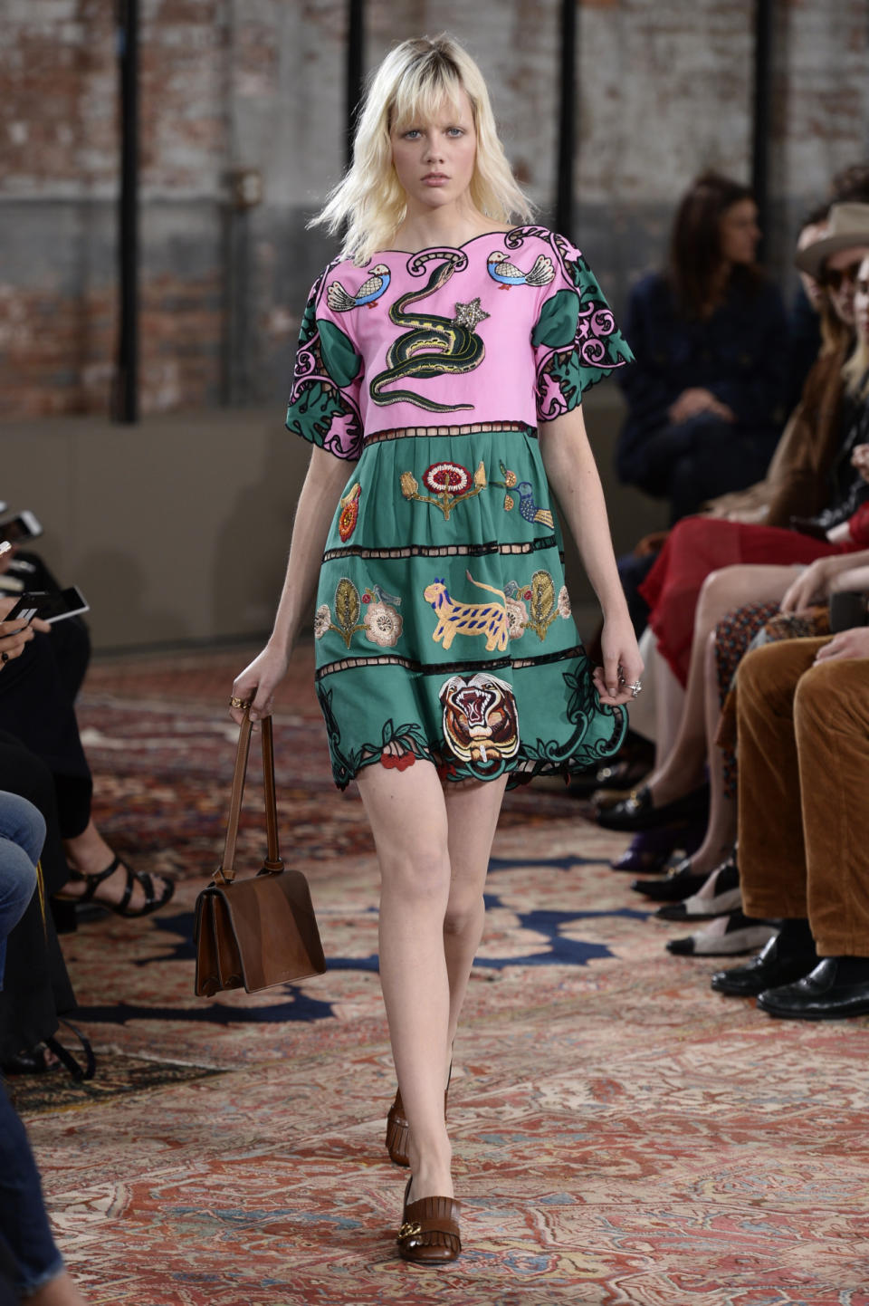 A green and pink dress with flower and animals patches from Gucci’s Resort 2016 collection.