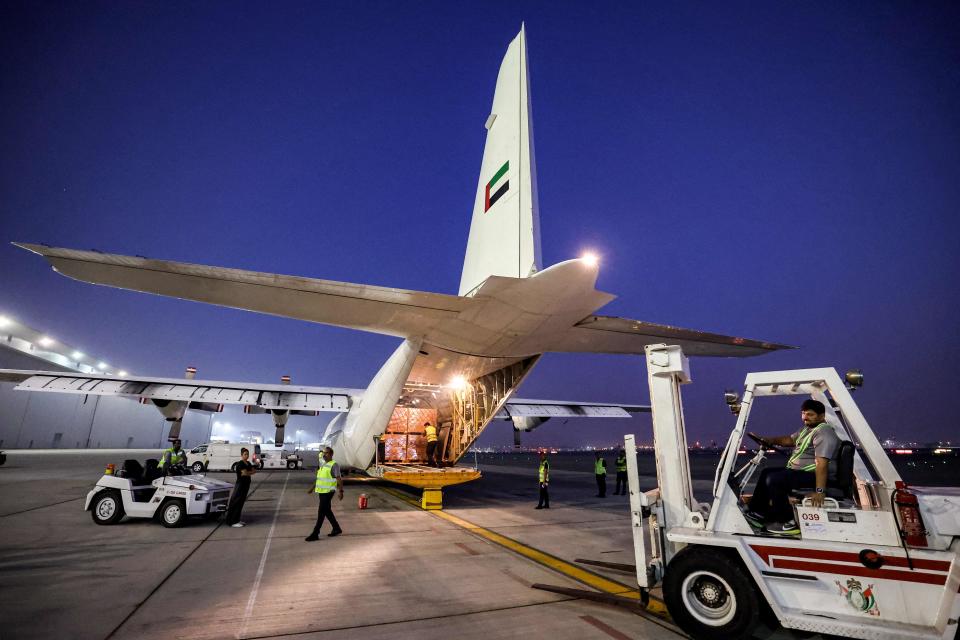 Aid is loaded onto to a UAE plane bound for Egypt (AFP)