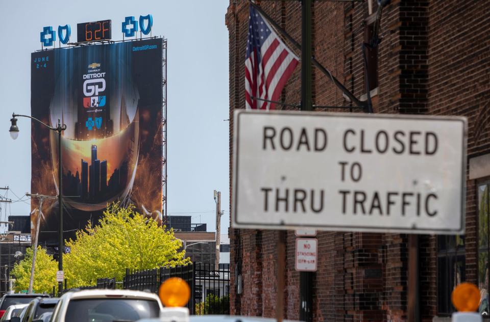 A large sign advertising the Detroit Grand Prix sits near Jefferson Avenue in downtown Detroit on Wednesday, May 24, 2023. 