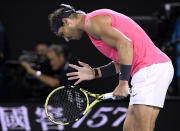 Spain's Rafael Nadal reacts during his quarterfinal against Austria's Dominic Thiem at the Australian Open tennis championship in Melbourne, Australia, Wednesday, Jan. 29, 2020. (AP Photo/Andy Brownbill)