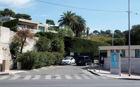 The entrance of the private residency where French President Emmanuel Macron and his wife Brigitte allegedly spent a few days of holidays  - Credit: AFP