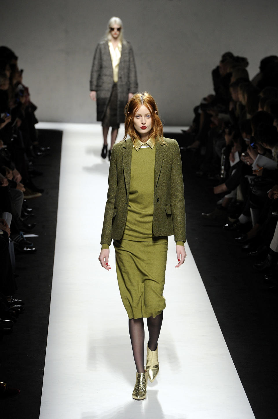 A model wears a creation for Max Mara women's Fall-Winter 2014-15 collection, part of the Milan Fashion Week, unveiled in Milan, Italy, Thursday, Feb. 20, 2014. (AP Photo/Giuseppe Aresu)