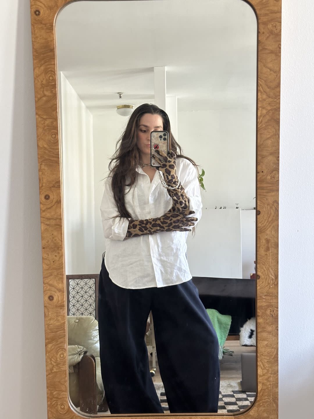 a woman taking a selfie in a mirror