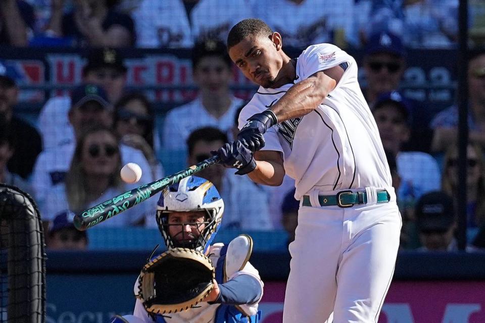 American League’s Julio Rodriguez, of the Seattle Mariners, bats during the MLB All-Star baseball Home Run Derby, Monday, July 18, 2022, in Los Angeles. (AP Photo/Jae C. Hong)