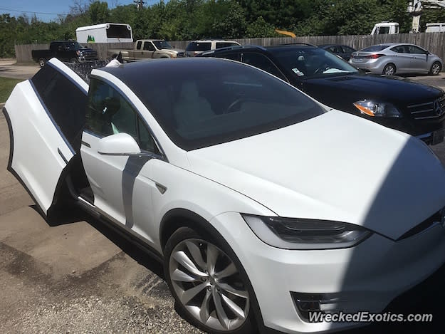 model x falcon wing doors crash