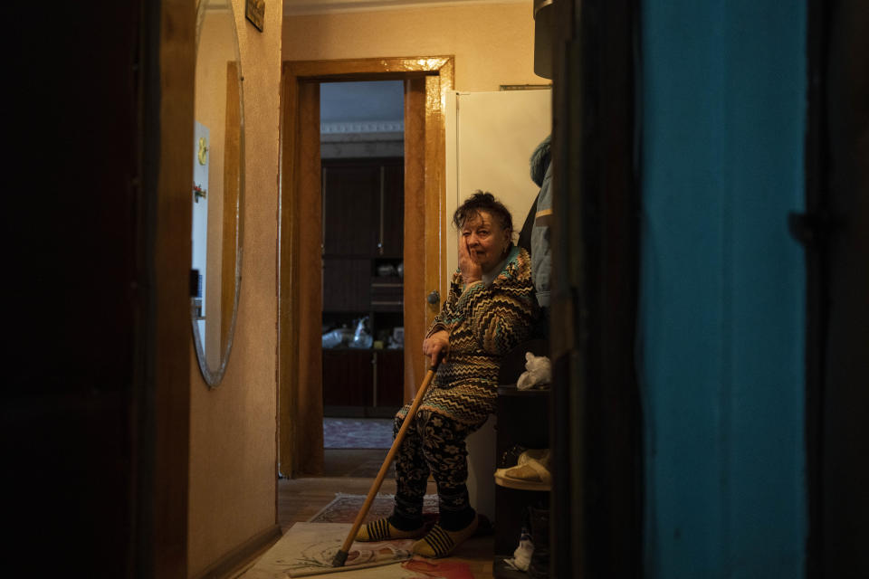 84 year-old widow, Alexandra Kulagina cries after receiving aid from the Red Cross in Mykolaiv, Ukraine, Wednesday, April 6, 2022. Alexandra prays for the end of the war. (AP Photo/Petros Giannakouris)