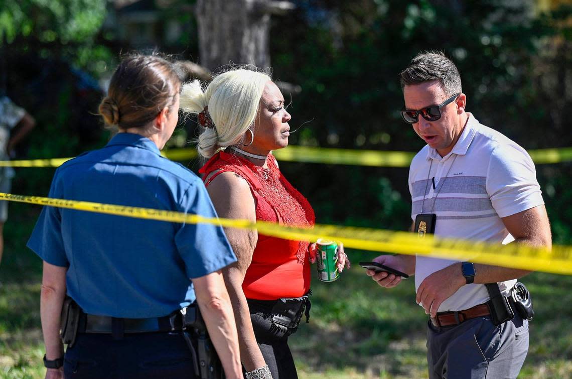 Kansas City Police Chief Stacey Graves, left, and a police detective spoke with Nikkia Manning, whose son, Nikko Manning, 22, died following a shooting early Sunday, June 25, 2023, near 57th Street and Prospect Avenue in Kansas City.