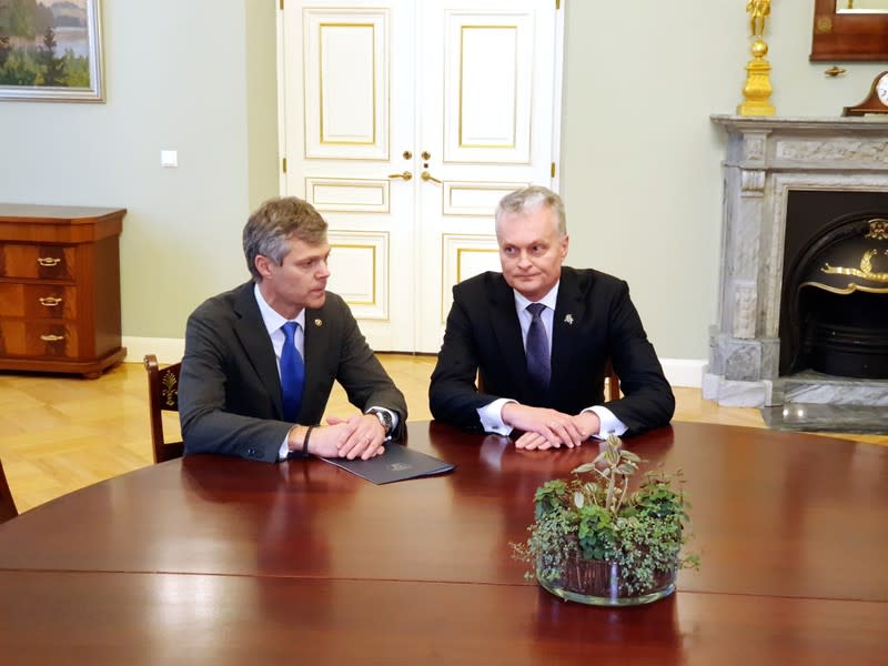 Lithuanian President Nauseda listens to Director of the State Security Department Jauniskis in Vilnius