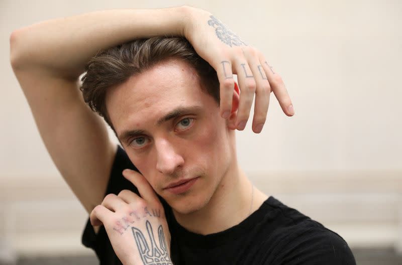 FILE PHOTO: Russian ballet dancer Sergei Polunin poses for a portrait as he rehearses at the Royal Opera House for the Project Polunin show in London