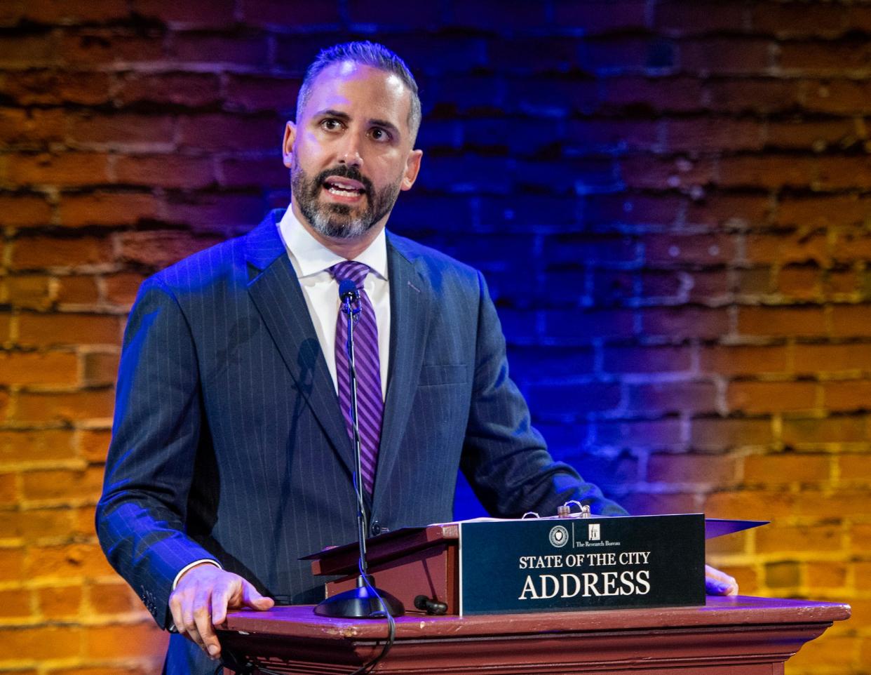 City Manager Eric D. Batista delivers the State of the City address at the Jean McDonough Arts Center Wednesday.