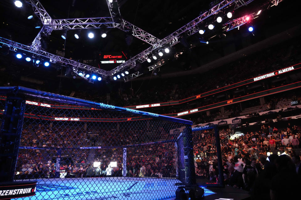 May 13, 2023; Charlotte, North Carolina, USA; The octagon is seen before a heavyweight bout between Jairzinho Rozenstruik (red gloves) and Jailton Almeida (blue gloves) during UFC Fight Night at Spectrum Center. Mandatory Credit: Jim Dedmon-USA TODAY Sports