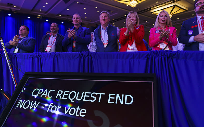Attendees clap after Sens. Ted Cruz (R-Texas) and J.D. Vance (R-Ohio) address the Conservative Political Action Conference (CPAC) at the Gaylord National Resort and Convention Center in National Harbor, Md., on Thursday, March 2, 2023. <em>Greg Nash</em>