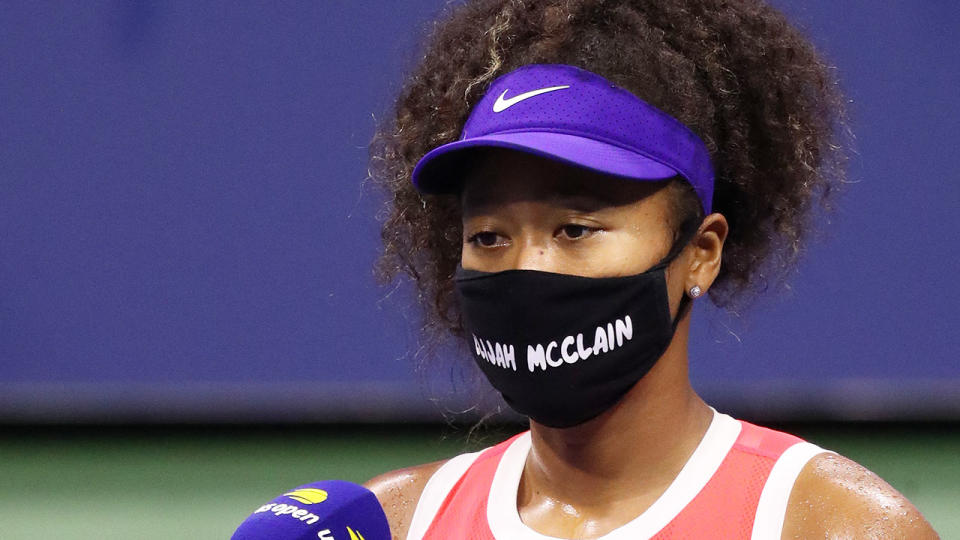 Pictured here, Naomi Osaka wearing one of the seven face masks she has brought to the US Open.