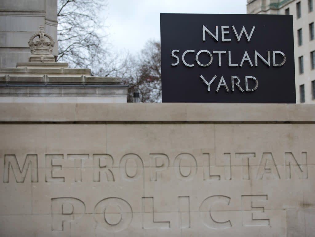 The New Scotland Yard logo outside the Metropolitan Police headquarters in London (Getty)