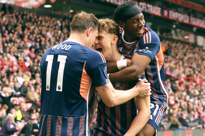 Ryan Yates (centre) celebrates scoring for Nottingham Forest against Sheffield United with Chris Wood and Anthony Elanga