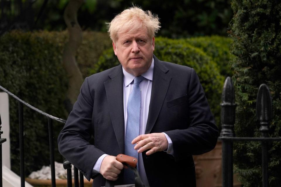 Boris Johnson made the shock announcement on Friday evening (AP)