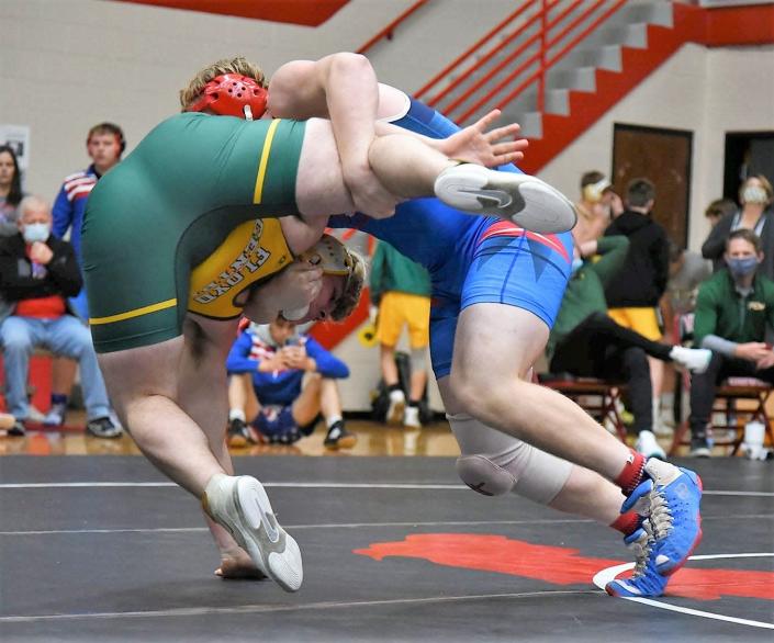Bryce Pardue-Mills (220) gets the takedown on his Floyd Central opponent. Pardue-Mills went undefeated on the day with a record of 5-0.