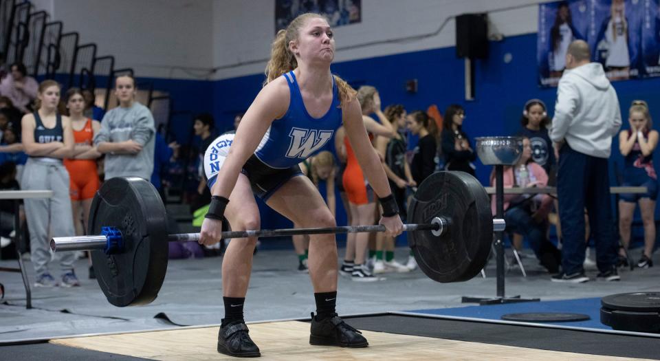 Female weightlifters compete for the top honors during    the District 1-2A girls' weightlifting championships at Washington High School on  Friday, Jan. 27, 2023. 