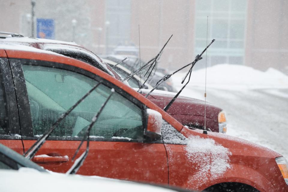 Windshield wipers up on vehicles on Martin Luther King Jr. Boulevard in Dover in February of 2015.