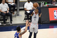 Washington Wizards guard Russell Westbrook (4) shoots against Philadelphia 76ers forward Danny Green (14) during the first half of Game 3 in a first-round NBA basketball playoff series, Saturday, May 29, 2021, in Washington. (AP Photo/Nick Wass)