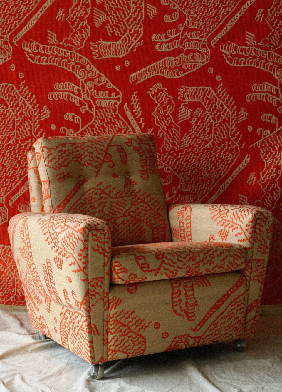 We also really want to settle into this 1960s armchair—reupholstered in Tiger Silk fabric by Dedar—with a good book.