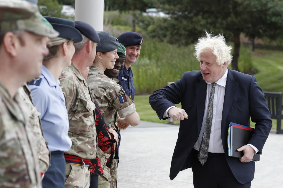 <p>Prime Minister Boris Johnson is greeted by military personnel as he arrives for a visit to Northwood Headquarters, the British Armed Forces Permanent Joint Headquarters, in Eastbury, north west London, where he met with personnel working on the UK operation in Afghanistan. Picture date: Thursday August 26, 2021.</p>
