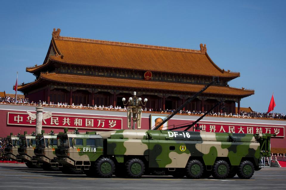 Chinese military vehicles carry DF-16 short-range ballistic missiles past Tiananmen Gate during a military parade to commemorate the 70th anniversary of the end of World War II in Beijing on Sept. 3, 2015.