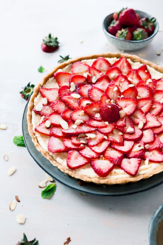 <p>Powered by Mom</p><p>Made with fresh fruit, mascarpone cheese and almonds, this tart is bound to be the hit of any summer gathering.</p><p><strong>Get the recipe: </strong><a href="https://powered-by-mom.com/no-bake-strawberry-mascarpone-tart/?fbclid=IwAR2Mx5dTN6jFpFrOLuxJfjYKcQl9SY2vI5LAzbufR1zstvRxgAPHgkUkPx8" rel="nofollow noopener" target="_blank" data-ylk="slk:Strawberry Mascarpone Tart;elm:context_link;itc:0;sec:content-canvas" class="link "><strong>Strawberry Mascarpone Tart</strong></a></p>